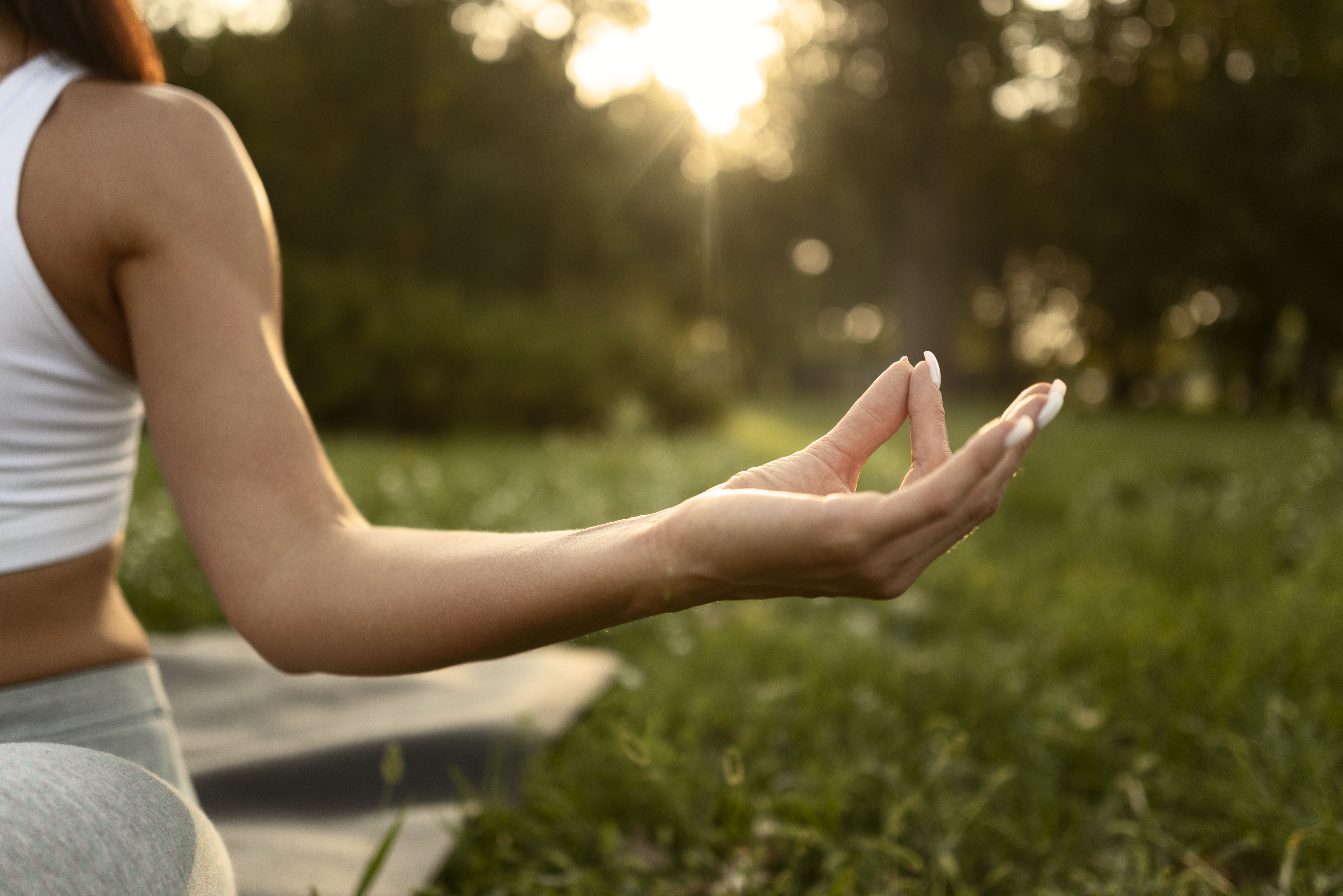 front-view-woman-meditating-in-nature